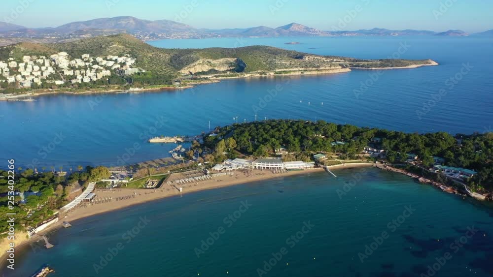 Aerial drone video of famous small islet with picturesque chapel of Agios Nikolaos and small marina, Anavissos area, Attica, Greece Aerial drone video of famous small islet with picturesque chapel of Agios Nikolaos and small marina, Anavissos area, Attica, Greece