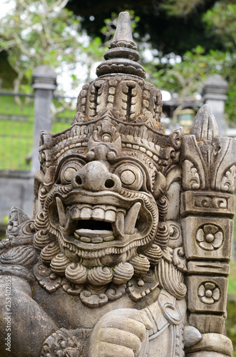Bali sculpture in front of temple