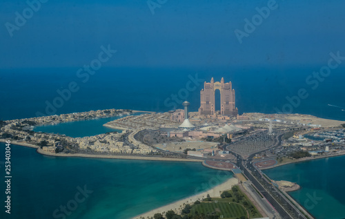 Fototapeta Naklejka Na Ścianę i Meble -  Bird's eye and aerial drone view of Abu Dhabi city from observation deck