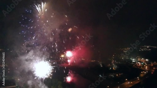 Drone footage of fireworks  high above a highway photo