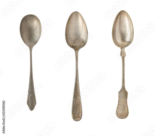 Vintage spoons isolated on a white background. Retro silverware.