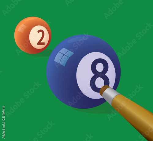 Billiard cue and pool balls on green table