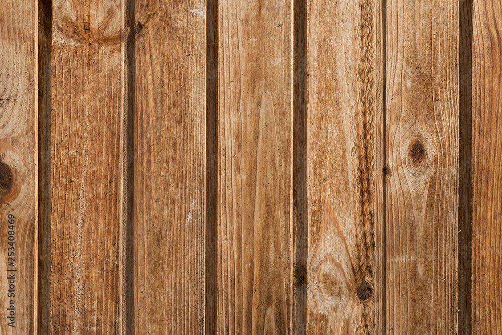 Naklejka premium Brown wooden texture background