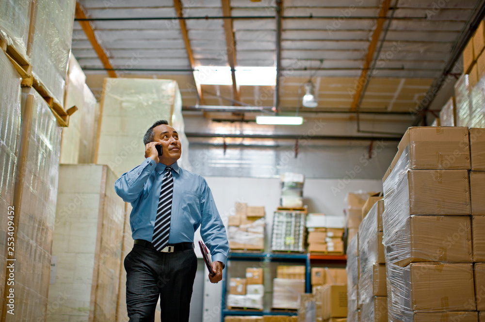 Man working in warehouse. Man working in warehouse.