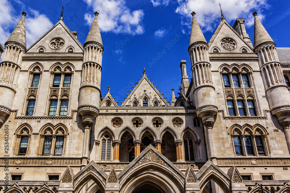 Architectural fragments of Royal Courts of Justice Complex. Royal Courts of Justice in the Victorian Gothic style (or Law Courts, was opened in December 1882) in London, UK.