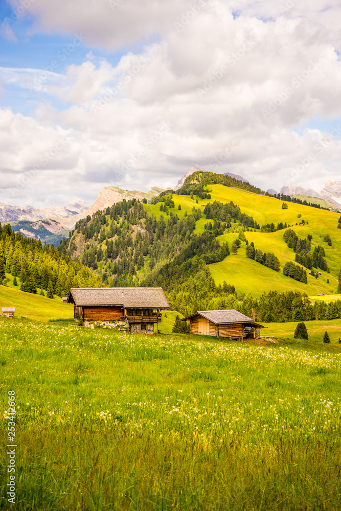 Italy, Alpe di Siusi, Seiser Alm with Sassolungo Langkofel Dolomite, an old barn in a field Italy, Alpe di Siusi, Seiser Alm with Sassolungo Langkofel Dolomite, an old barn in a field
