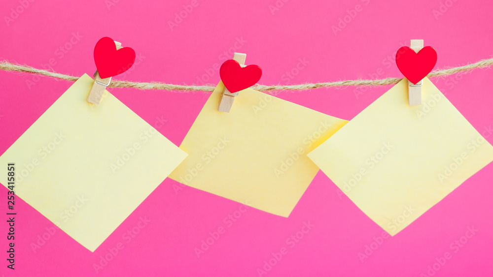 Blank sheet of paper on the rope with a clothespin Blank sheet of paper on the rope with a clothespin