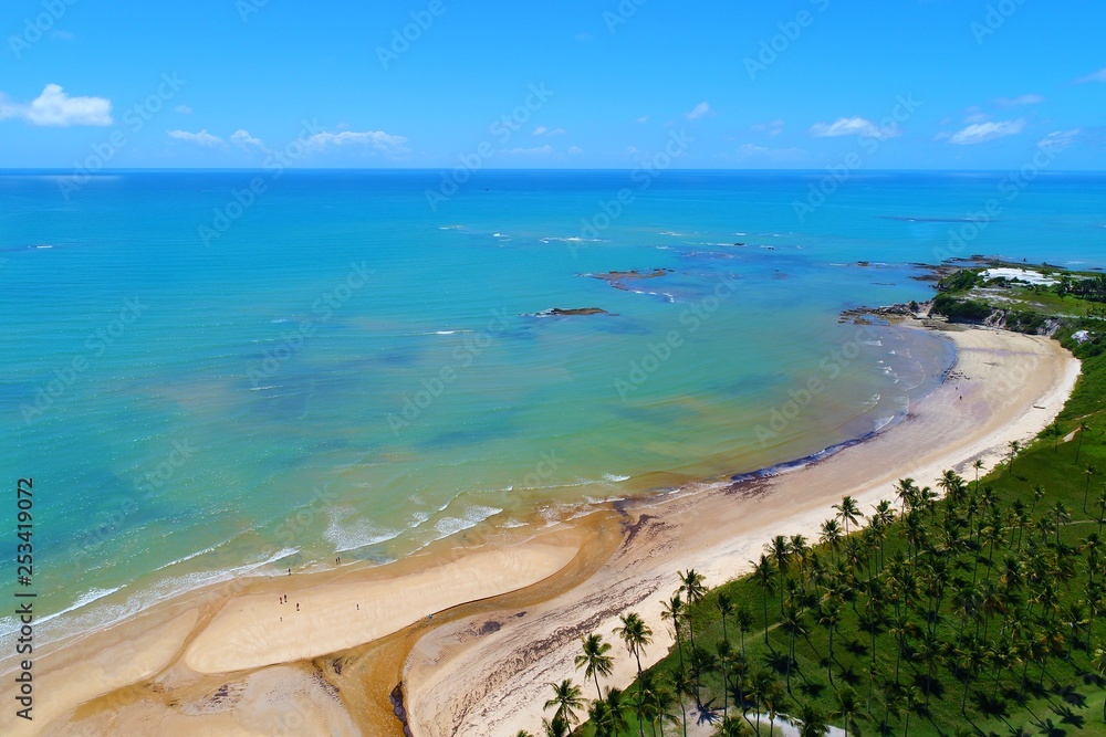 Aerial view of Cumuruxatiba Beach, Prado, Bahia, Brazil. Great landscape. Beautiful beach and river sceneries. Tropical travel. Travel Destination. Vacation travel. Nature scenery.