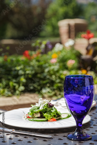 Garden terrace table with salad