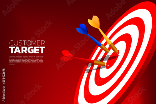 multi color dart arrows hit the center of dartboard . Business Concept of marketing target and customer.Company vision mission and goal.