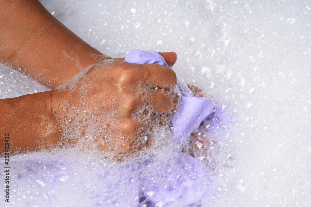 Fototapeta premium woman washing hands in bathroom