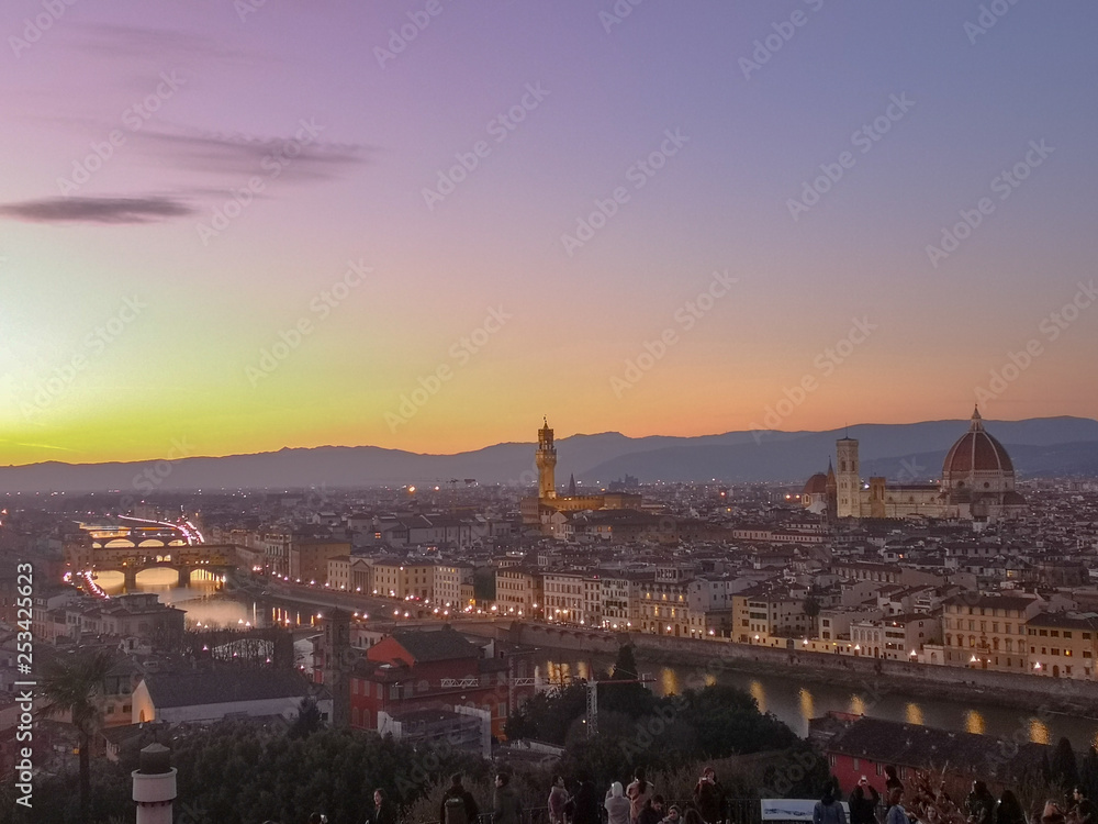 Fototapeta florence,tuscany/Italy 24 february 2019 :sunset in florence ,shot made from michelangelo square,the sky is beaytiful colored