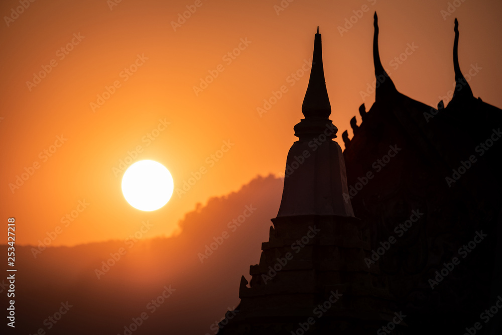 Sunset at public temple in Champasak town, Laos
