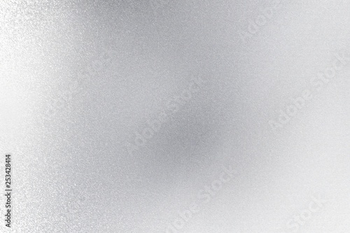 Shiny brushed silver metallic wall, abstract texture background