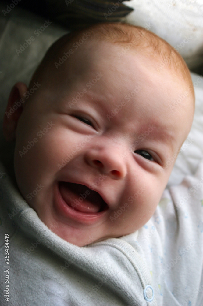 a two-month baby smiles, laughs, rejoices and looks a two-month baby smiles, laughs, rejoices and looks