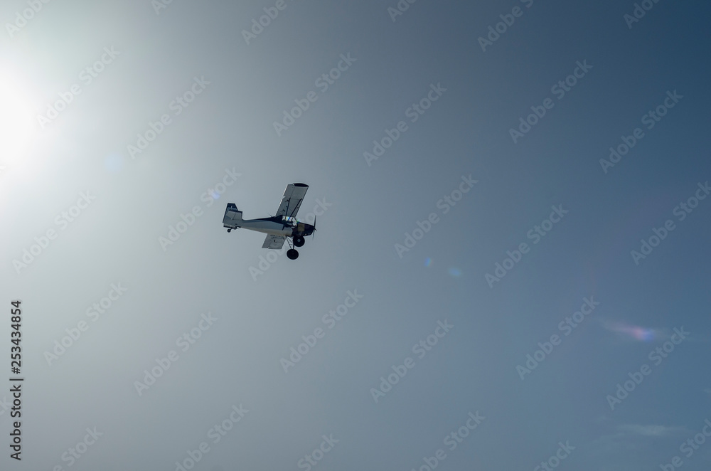 Training aircraft on the background of the sun. Training aircraft on the background of the sun.