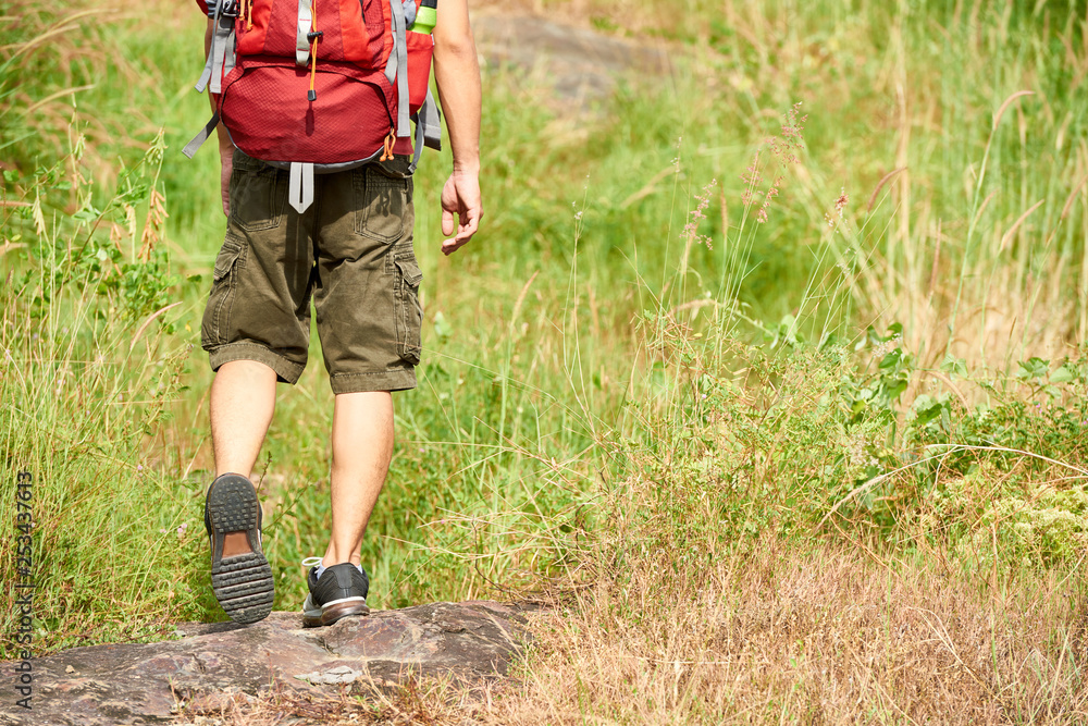 Trekking man with backpack Trekking man with backpack