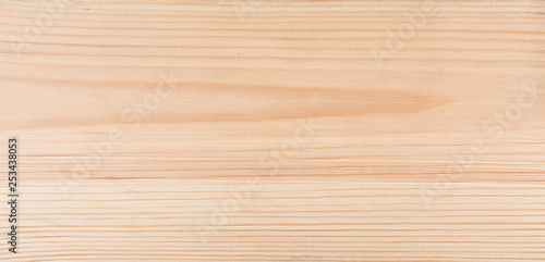 Background planed pine boards. Light bright wood texture.