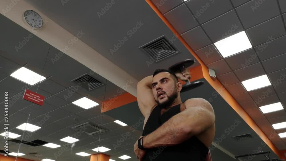 Dumbbell young man at gym workout hands fitness weightlifting Dumbbell young man at gym workout hands fitness weightlifting