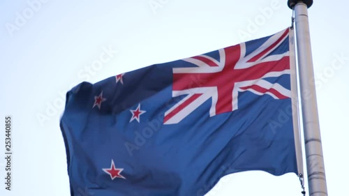 New Zealand flag flies in wind close up in slow motion