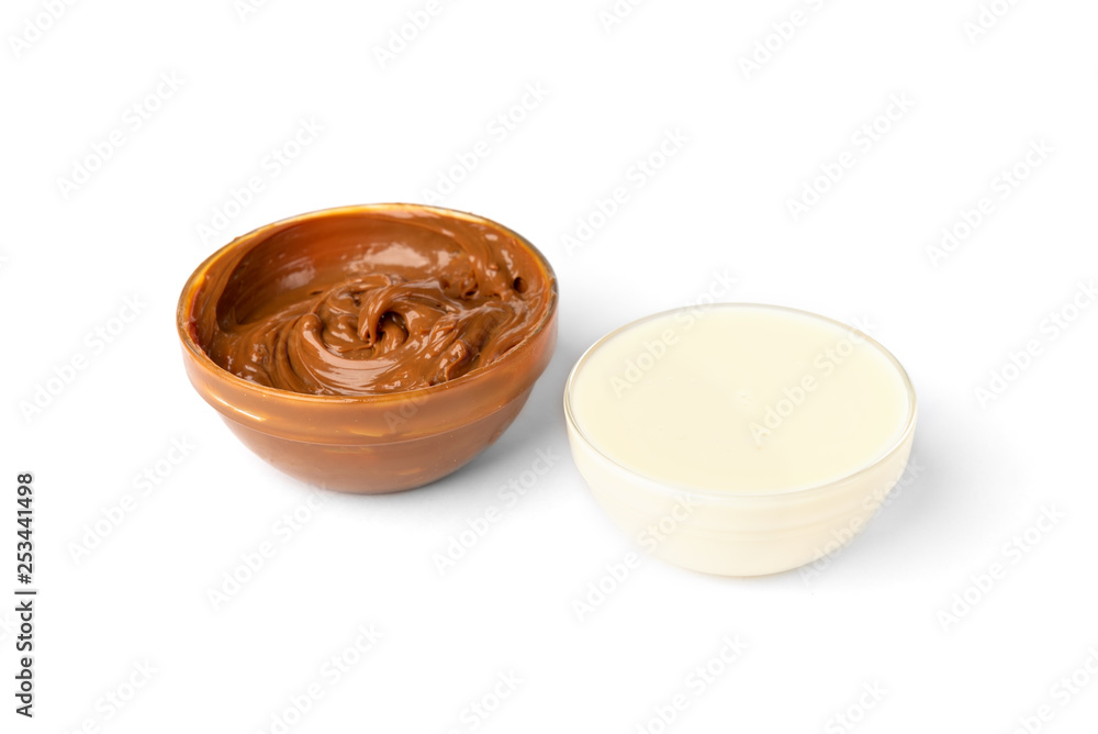 Boiled condensed milk isolated on white background. Boiled condensed milk isolated on white background.