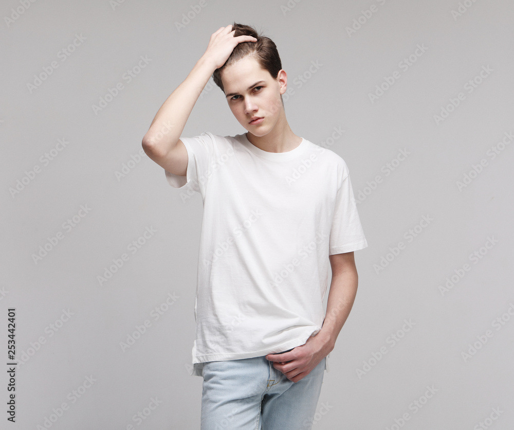 Young Male Model wearing white t-shirt Young Male Model wearing white t-shirt