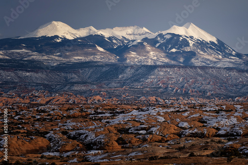 Sunlit LaSal Mtns in the evening;  Arches National Park;  Utah photo