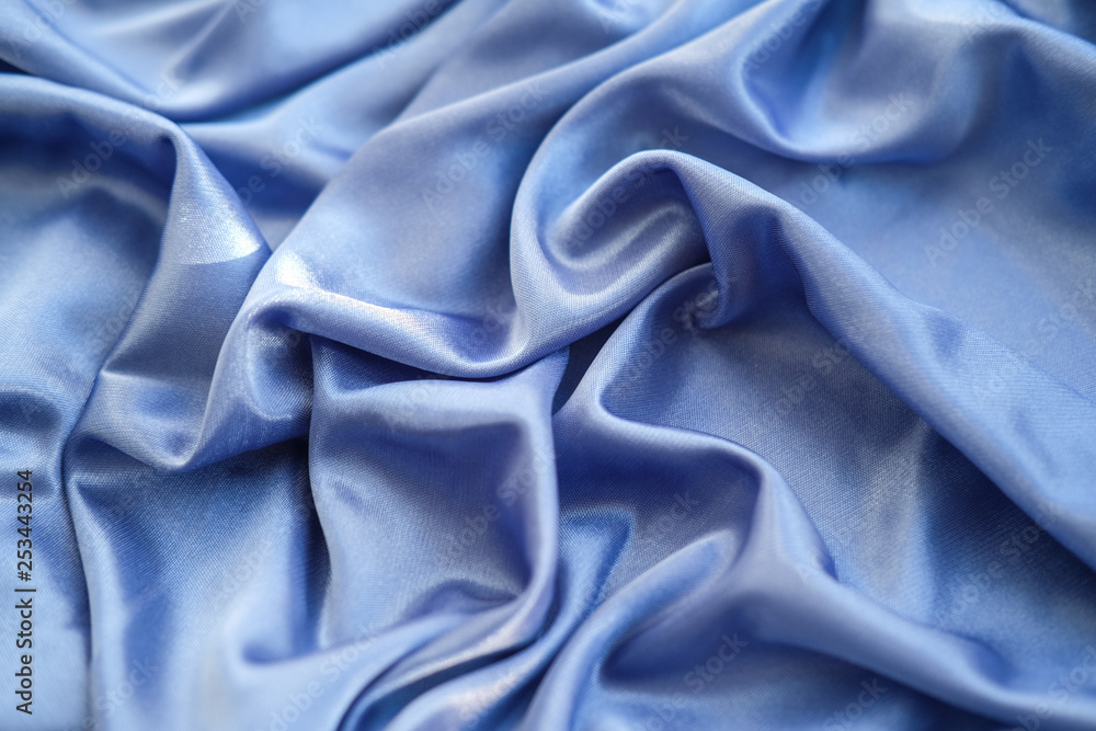 Obraz premium Fabric blue waves - material for background and texture.
