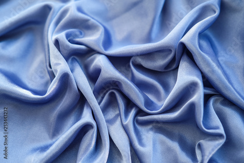 Fabric blue waves - material for background and texture.