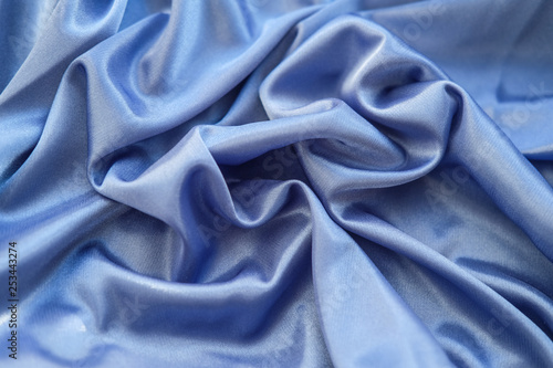 Fabric blue waves - material for background and texture.