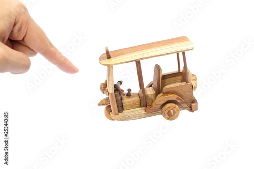 Wooden Tuk Tuk  Taxi model. Three-Wheels on isolated photo