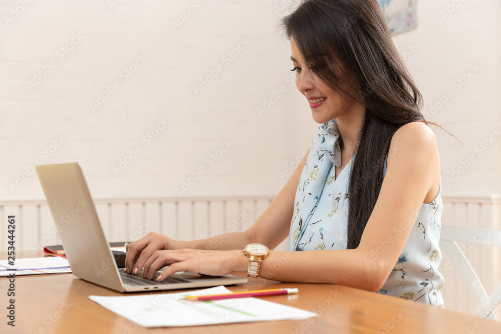 Freelancer business woman working with computer laptop in cafe. Freelancer business woman working with computer laptop in cafe.