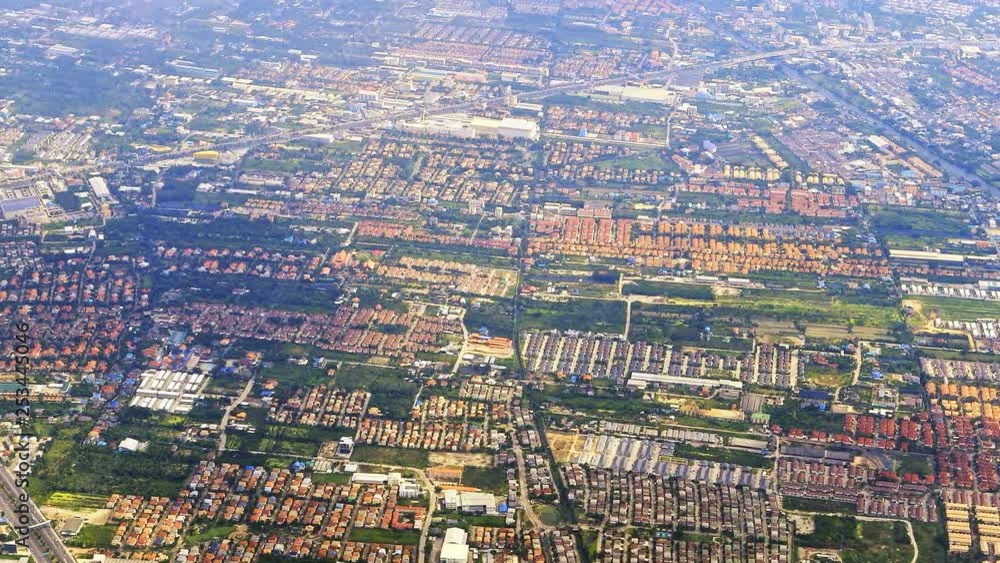 Aerial view of suburb houses near Bangkok. Residential area district from sky panorama Aerial view of suburb houses near Bangkok. Residential area district from sky panorama