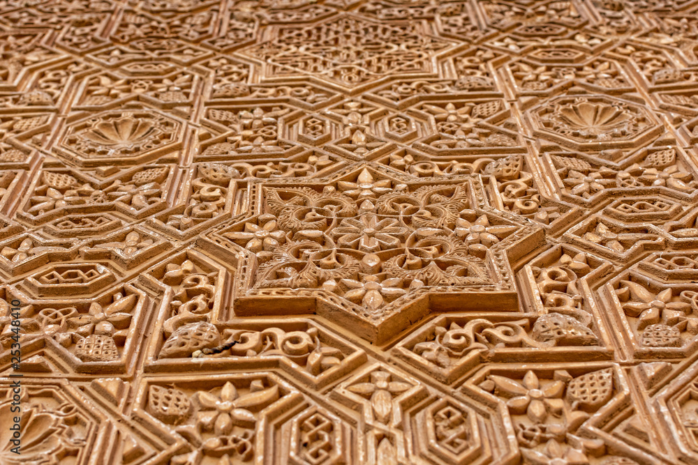 Ornate restored wall detail of Alhambra palace 