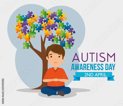 kid and tree with puzzles leaves to autism day