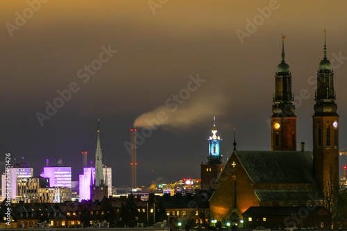 Stockholm, Sweden Night view of city with Högalid Church, City Hall, and downtown.