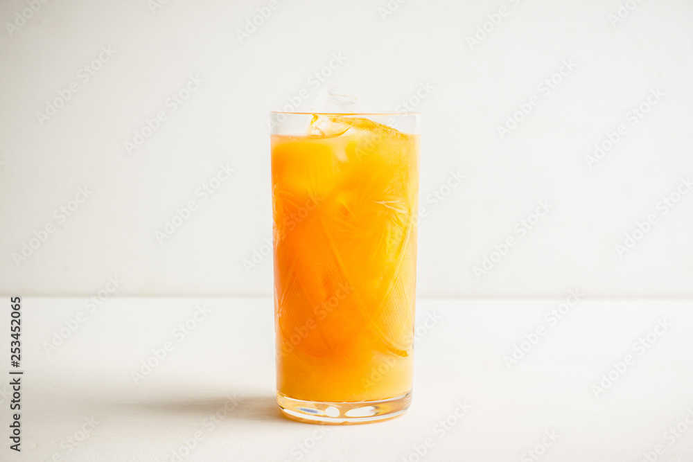 Fresh beverage with mandarines on the rustic background. Selective focus. Shallow depth of field. Fresh beverage with mandarines on the rustic background. Selective focus. Shallow depth of field.