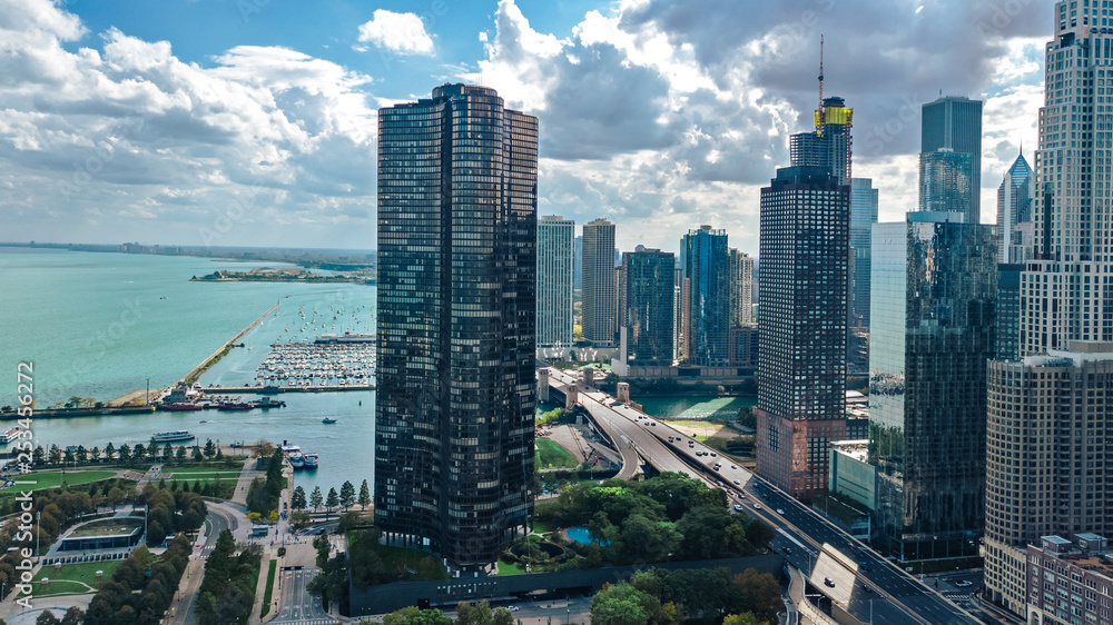 Fototapeta premium Chicago skyline aerial drone view from above, city of Chicago downtown skyscrapers and lake Michigan cityscape, Illinois, USA