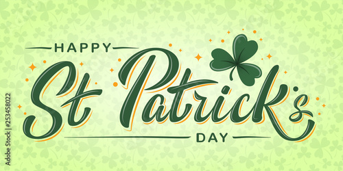 Happy St. Patrick's Day lettering poster with green shamrock and orange stars on light green clover background. For greeting cart, poster, banner, flyer, web pages, social media. Vector illustration