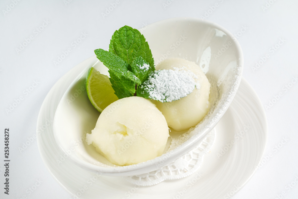 sorbet ice cream with mint in bowl