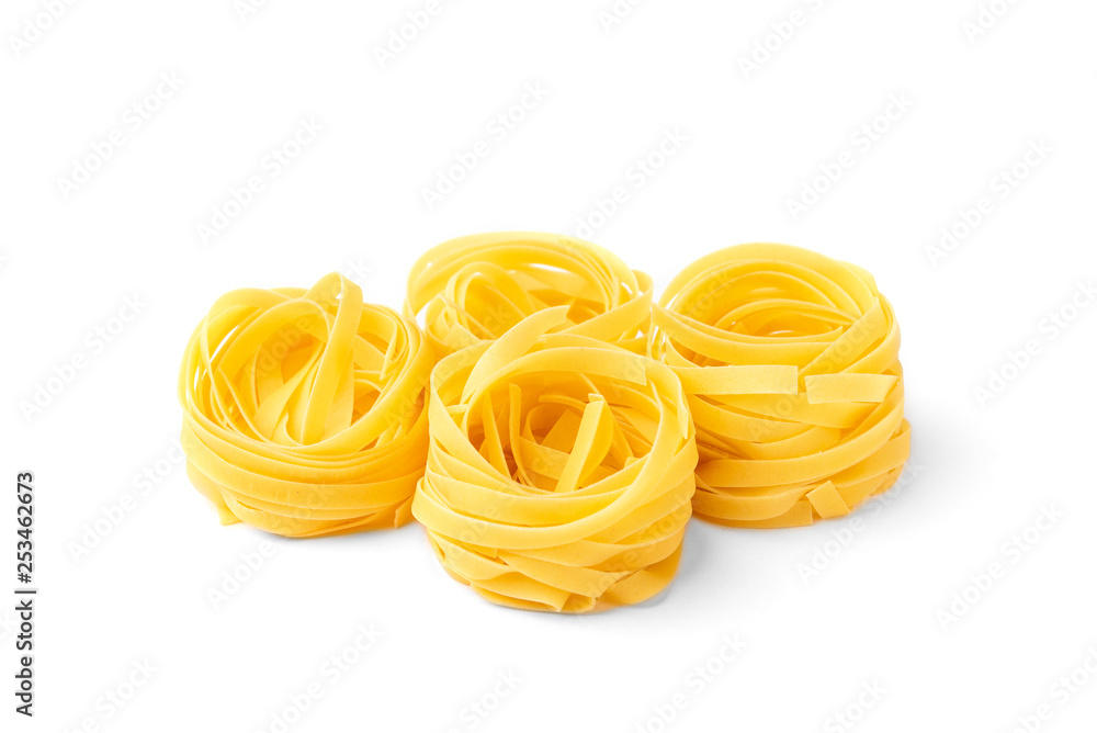 Pasta nests isolated on white background. Pasta nests isolated on white background.