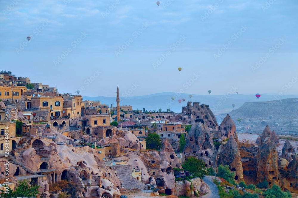 View of ancient Nevsehir cave town and a castle of Uchisar dug from a mountains in Cappadocia, Central Anatolia,Turkey 