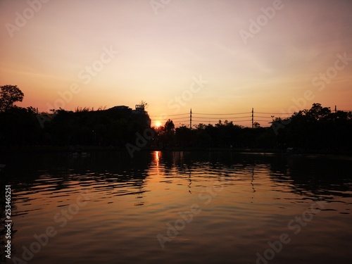Sunset overcast sky Reflection in the water © pakn