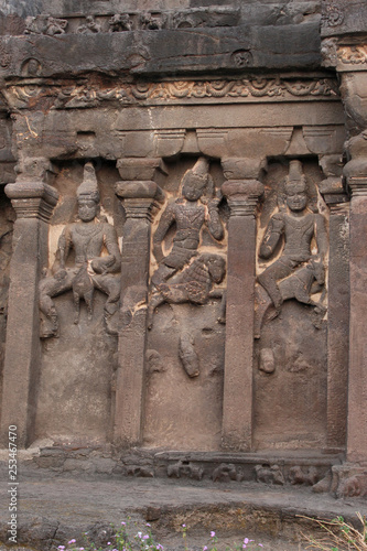 Outer wall of cave 16, facade detail with Karthikeya, Agni and Vayu, Hindu Caves, Ellora, Aurangabad, Maharashtra.