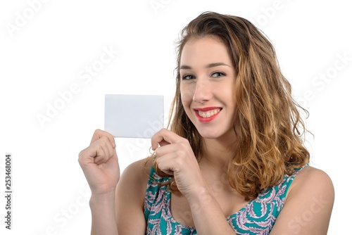 pretty young woman showing small empty card