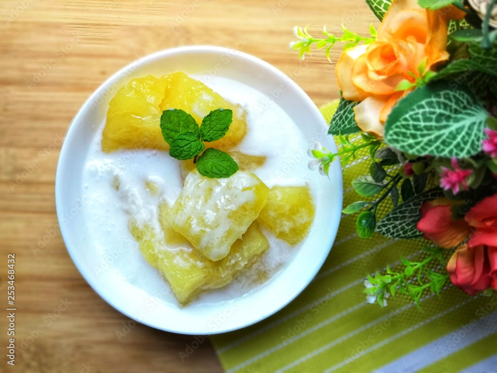 Cassava in syrup topped with coconut milk Cassava in syrup topped with coconut milk
