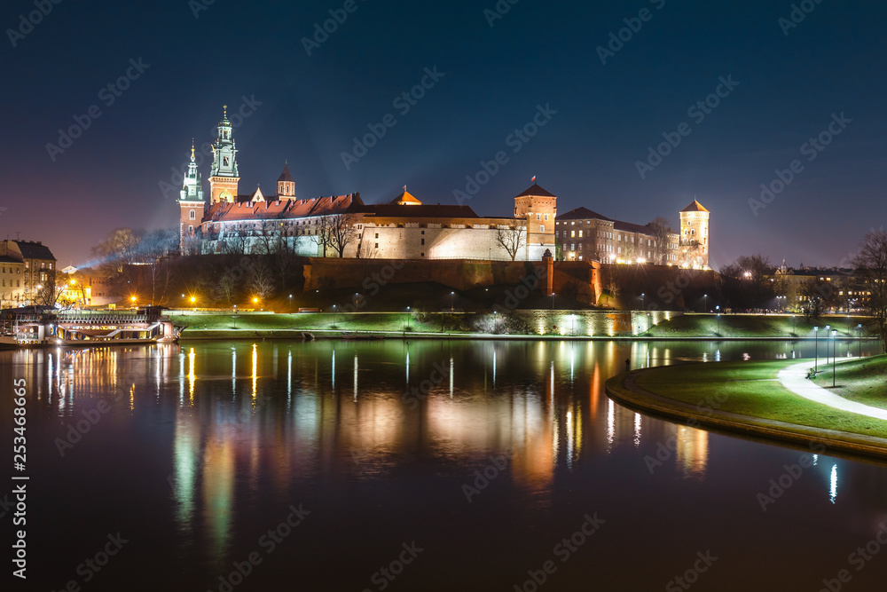 Wawel hill with royal castle at night. Krakow is one of the most famous landmark in Poland