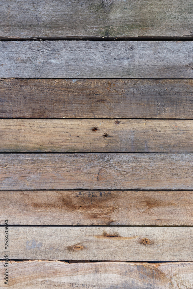 Old wooden boards with knots as a natural background Old wooden boards with knots as a natural background