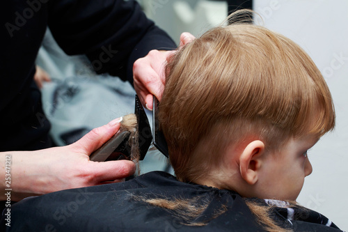 The little boy in the barber shop