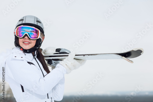 charming sportswoman with sport equipment looking at the camera, close up photo. lifestyle